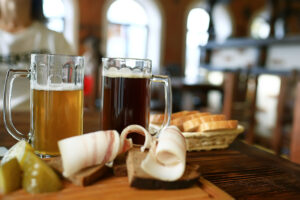 two beer mugs in a Czech beer restaurant / light and dark beer i